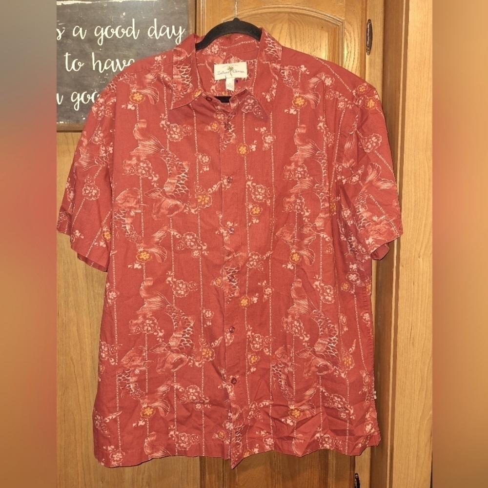 An Island Shores short sleeve button-down Hawaiian shirt in a size men's XL